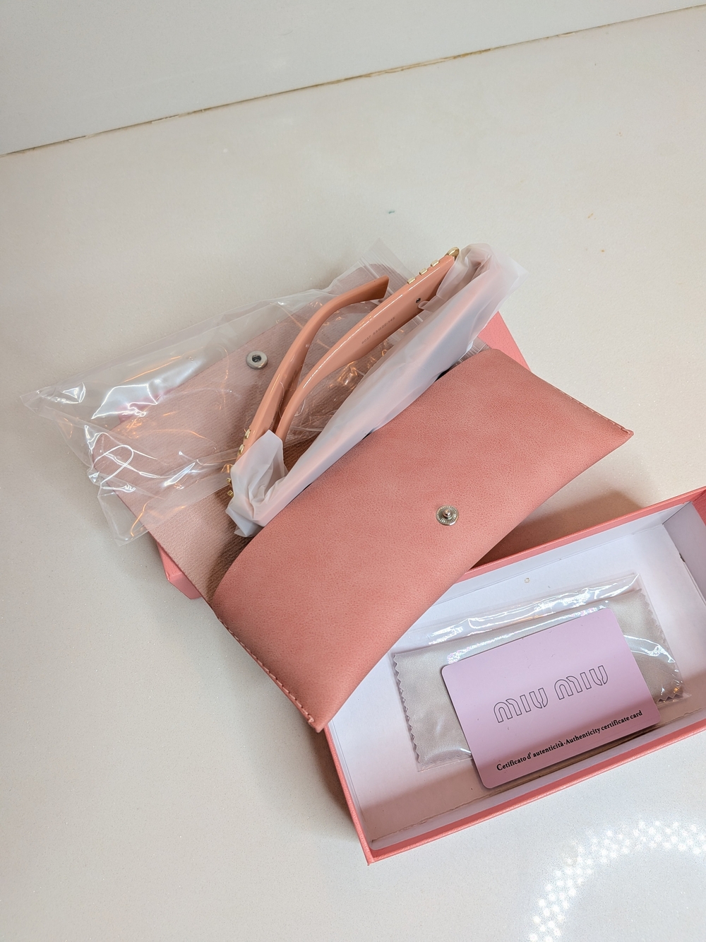 Miu Miu Pink Cat-Eye Sunglasses with Gold Logo Accent - Picture 9 of 12